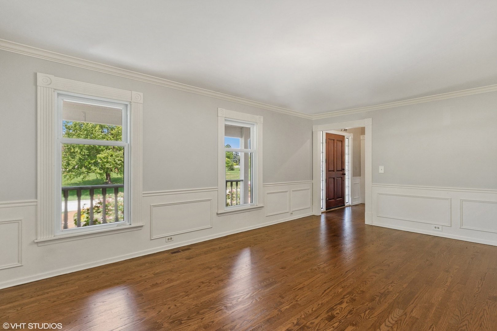 23905 West Bedlington Circle Deer Park, IL 60010 - Photo 5 of 23 a view of an empty room with wooden floor and a window