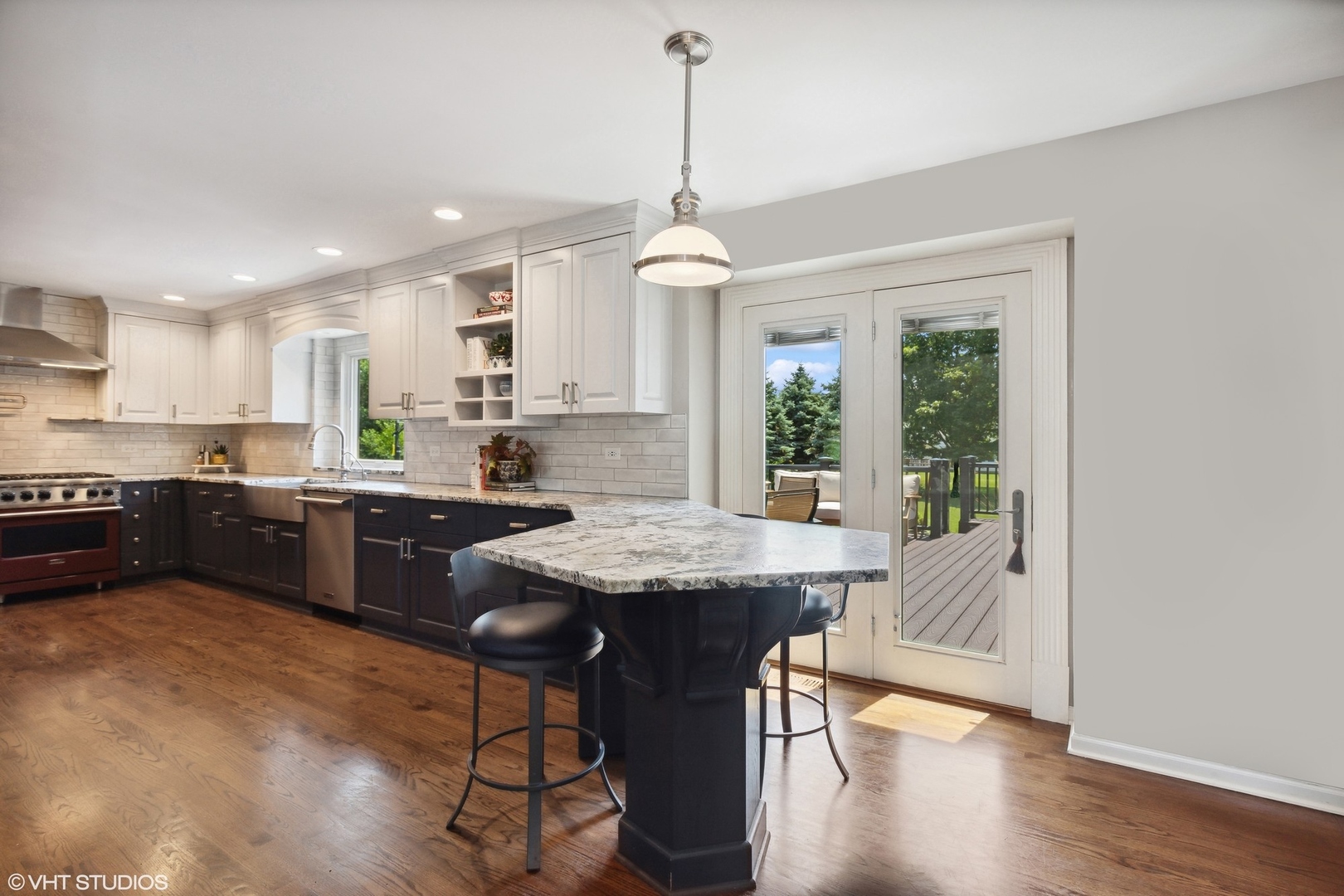 23905 West Bedlington Circle Deer Park, IL 60010 - Photo 9 of 23 a kitchen with stainless steel appliances granite countertop a kitchen island hardwood floor sink stove dining table and chairs