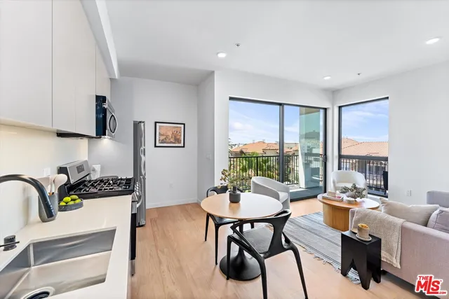 a workspace with furniture and window