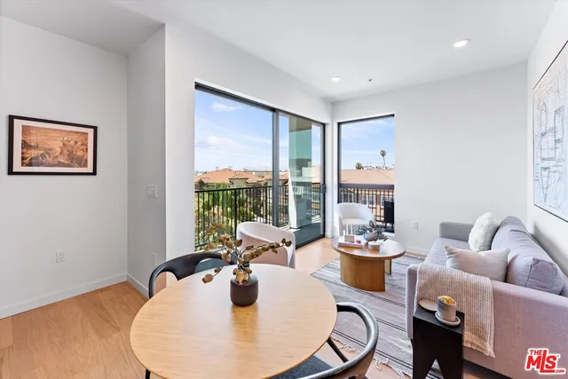 a room with furniture or window and a potted plant