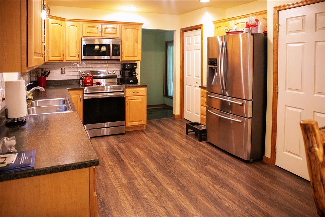 50 Anthony's Road White Haven, PA 18661 - Photo 16 of 57 a kitchen with stainless steel appliances a stove refrigerator and a microwave
