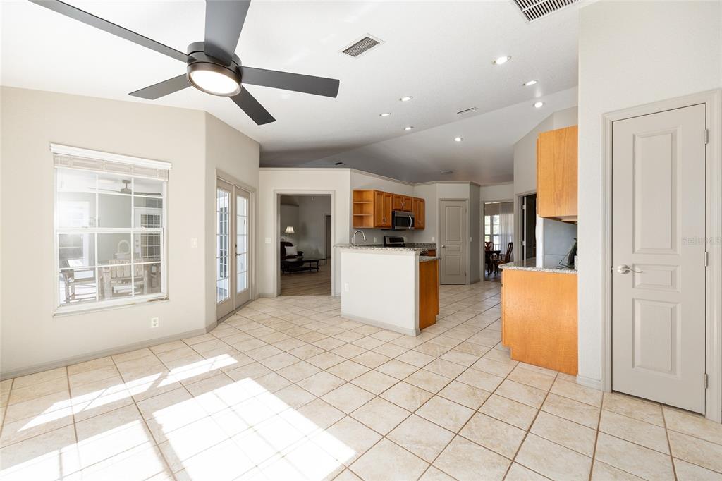 1120 East Highway 316 Citra, FL 32113 - Photo 16 of 61 a view of a kitchen with furniture and a window