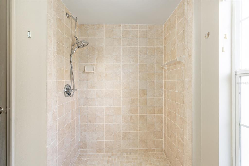 1120 East Highway 316 Citra, FL 32113 - Photo 19 of 61 a bathroom with a shower