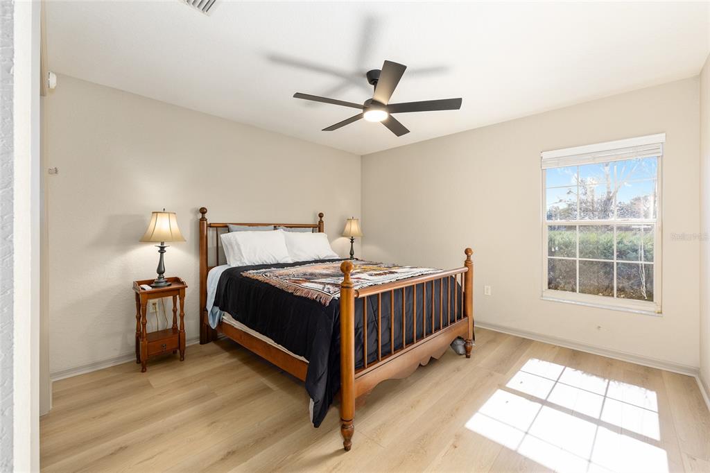 1120 East Highway 316 Citra, FL 32113 - Photo 20 of 61 a bedroom with a bed and window