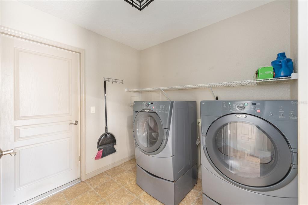 1120 East Highway 316 Citra, FL 32113 - Photo 28 of 61 a utility room with dryer and washer