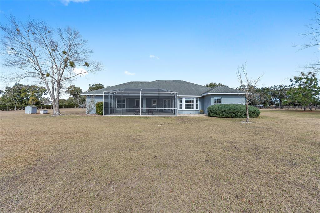 1120 East Highway 316 Citra, FL 32113 - Photo 36 of 61 a house with trees in front of it