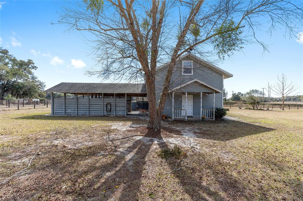 1120 East Highway 316 Citra, FL 32113 - Photo 39 of 61 a house with trees in front of it