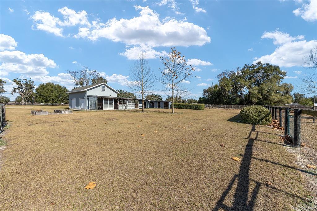 1120 East Highway 316 Citra, FL 32113 - Photo 52 of 61 a view of house with outdoor space and sitting area