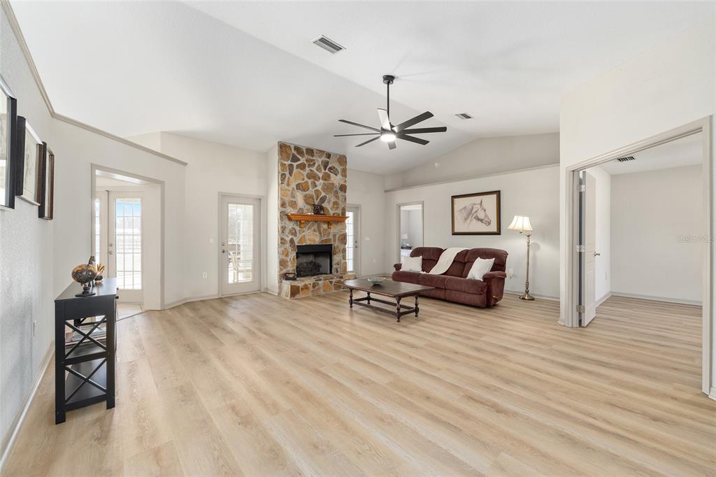 1120 East Highway 316 Citra, FL 32113 - Photo 9 of 61 a view of a livingroom with hardwood and furniture