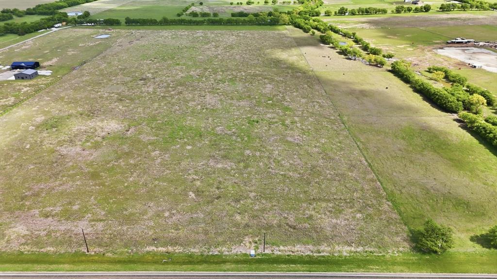 0 Fm 455 Decatur, TX 76234 - Photo 6 of 20 Expansive open land featuring a roadside frontage and varied green terrain