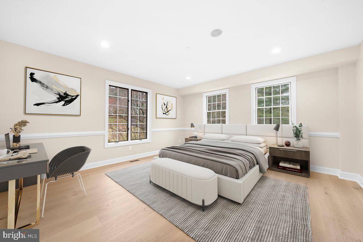4205 Goshen Road Newtown Square, PA 19073 - Photo 11 of 104 a spacious bedroom with a bed and a couch