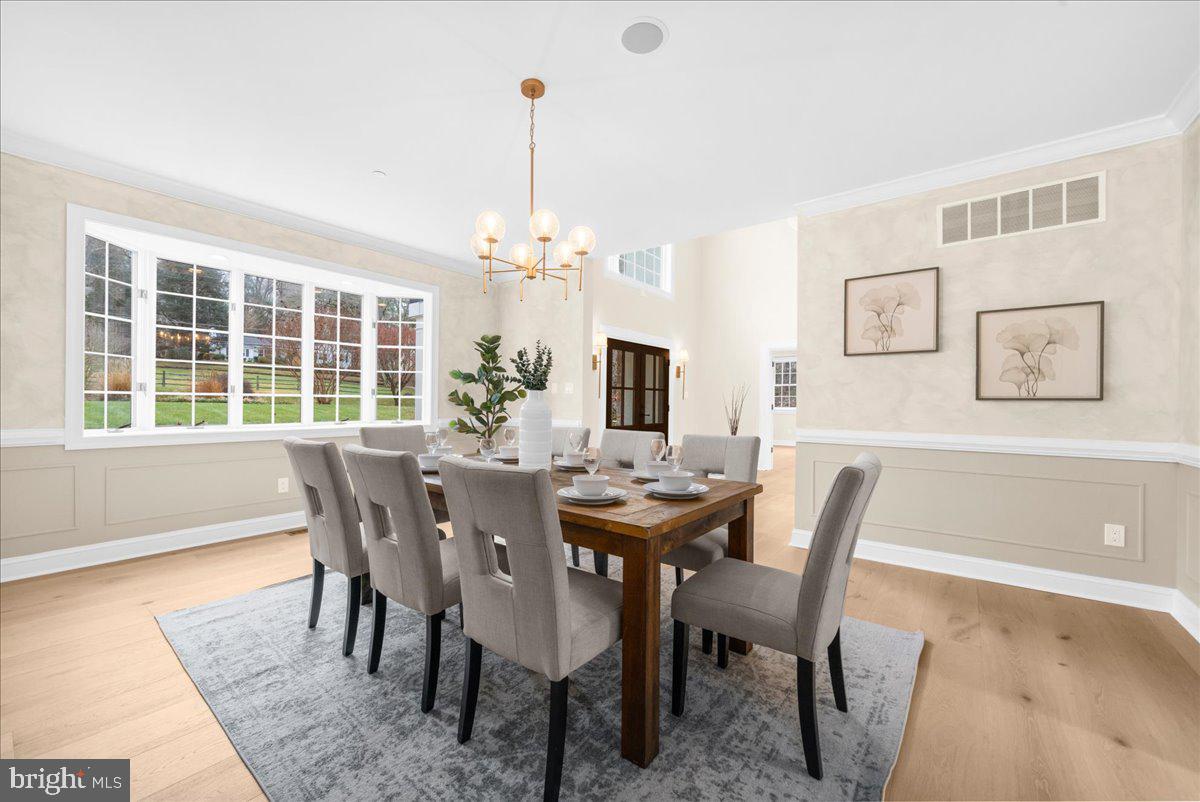 4205 Goshen Road Newtown Square, PA 19073 - Photo 15 of 104 a view of a dining room with furniture window and wooden floor