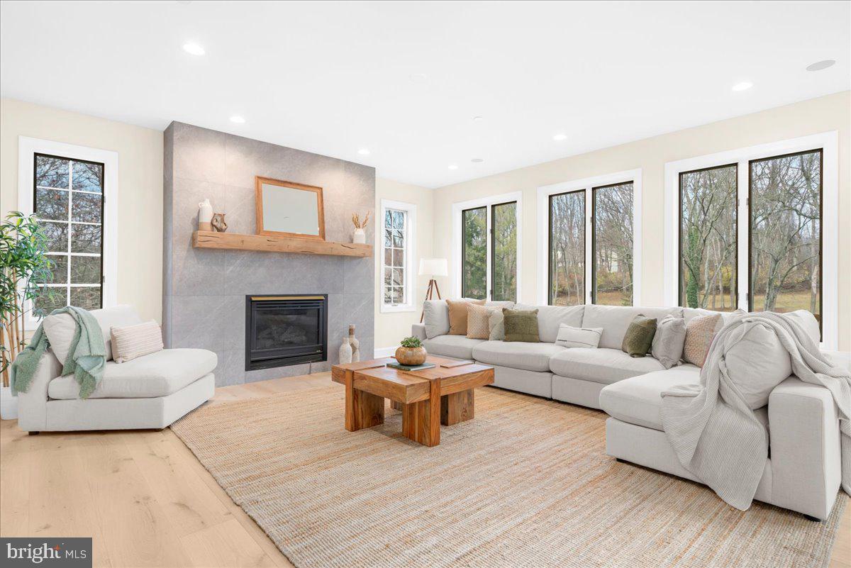 4205 Goshen Road Newtown Square, PA 19073 - Photo 17 of 104 a living room with furniture and a fireplace