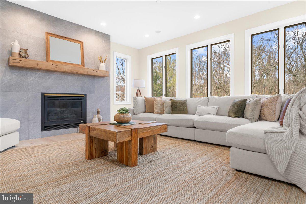 4205 Goshen Road Newtown Square, PA 19073 - Photo 18 of 104 a living room with furniture and a fireplace
