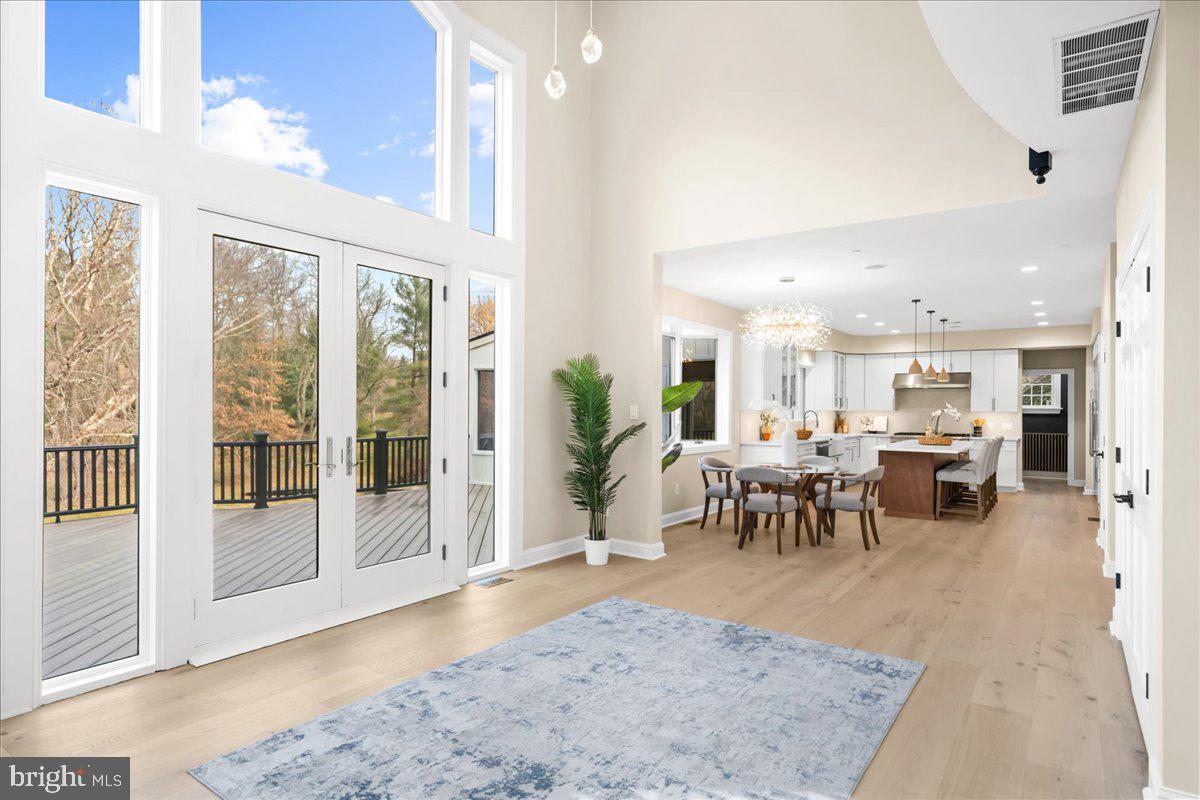 4205 Goshen Road Newtown Square, PA 19073 - Photo 22 of 104 a view of a dining area with furniture window and wooden floor
