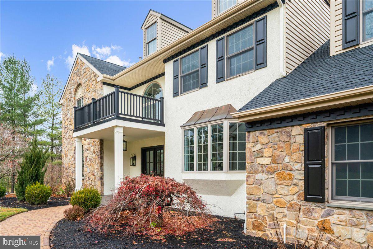 4205 Goshen Road Newtown Square, PA 19073 - Photo 3 of 104 front view of a brick house with a large window
