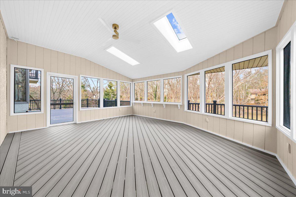 4205 Goshen Road Newtown Square, PA 19073 - Photo 34 of 104 a view of an empty room with wooden floor and a window