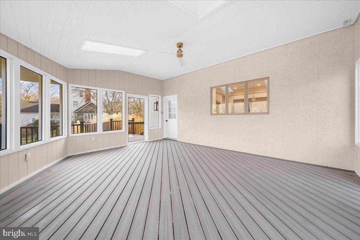 4205 Goshen Road Newtown Square, PA 19073 - Photo 36 of 104 a view of an empty room with wooden floor and a window