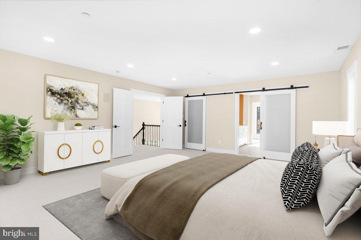 4205 Goshen Road Newtown Square, PA 19073 - Photo 44 of 104 a bedroom with a bed and a couch