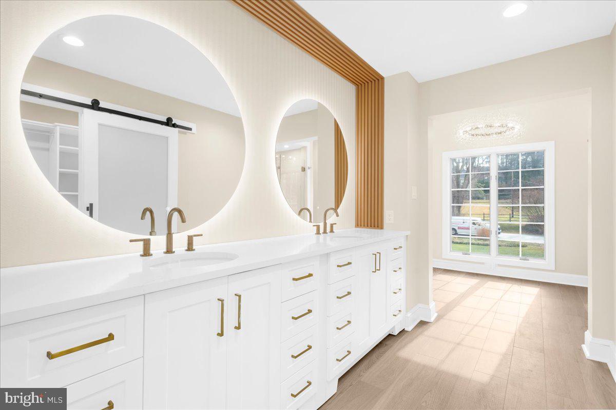 4205 Goshen Road Newtown Square, PA 19073 - Photo 46 of 104 a bathroom with a double vanity sink mirror and