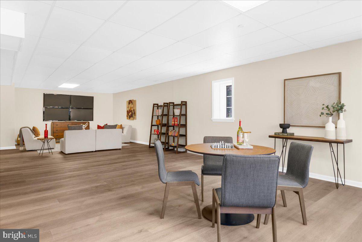 4205 Goshen Road Newtown Square, PA 19073 - Photo 80 of 104 a view of a dining room with furniture and wooden floor