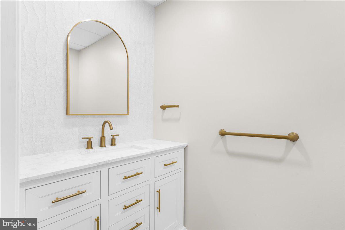 4205 Goshen Road Newtown Square, PA 19073 - Photo 85 of 104 a bathroom with a sink and a mirror