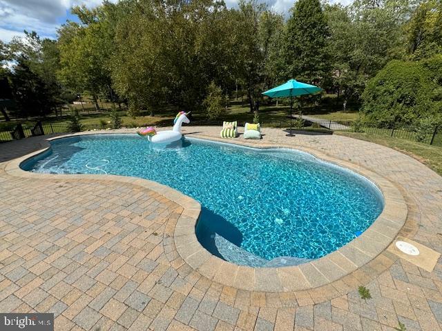 4205 Goshen Road Newtown Square, PA 19073 - Photo 92 of 104 a view of a swimming pool with a patio and plants