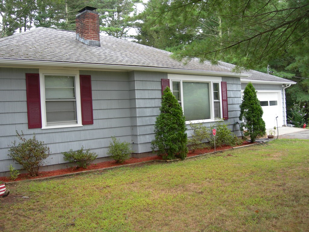 24 Morton Road Freetown, MA 02717 - Photo 3 of 12 a front view of a house with garden