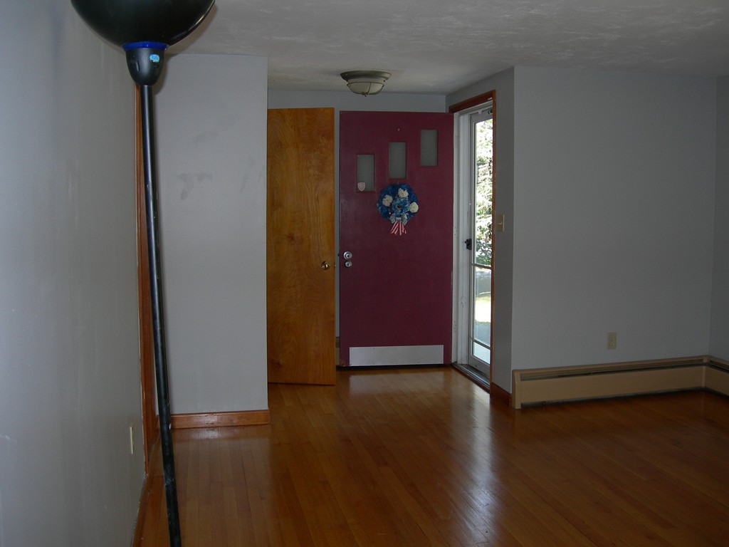 24 Morton Road Freetown, MA 02717 - Photo 10 of 12 a view of a hallway with wooden floor