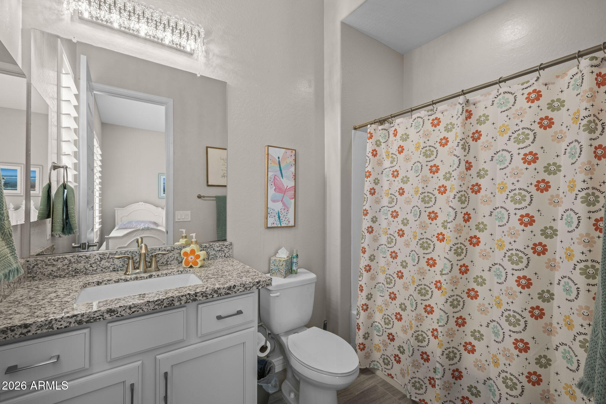 5250 South Wesley Mesa, AZ 85212 - Photo 29 of 89 a bathroom with a granite countertop toilet sink mirror and shower