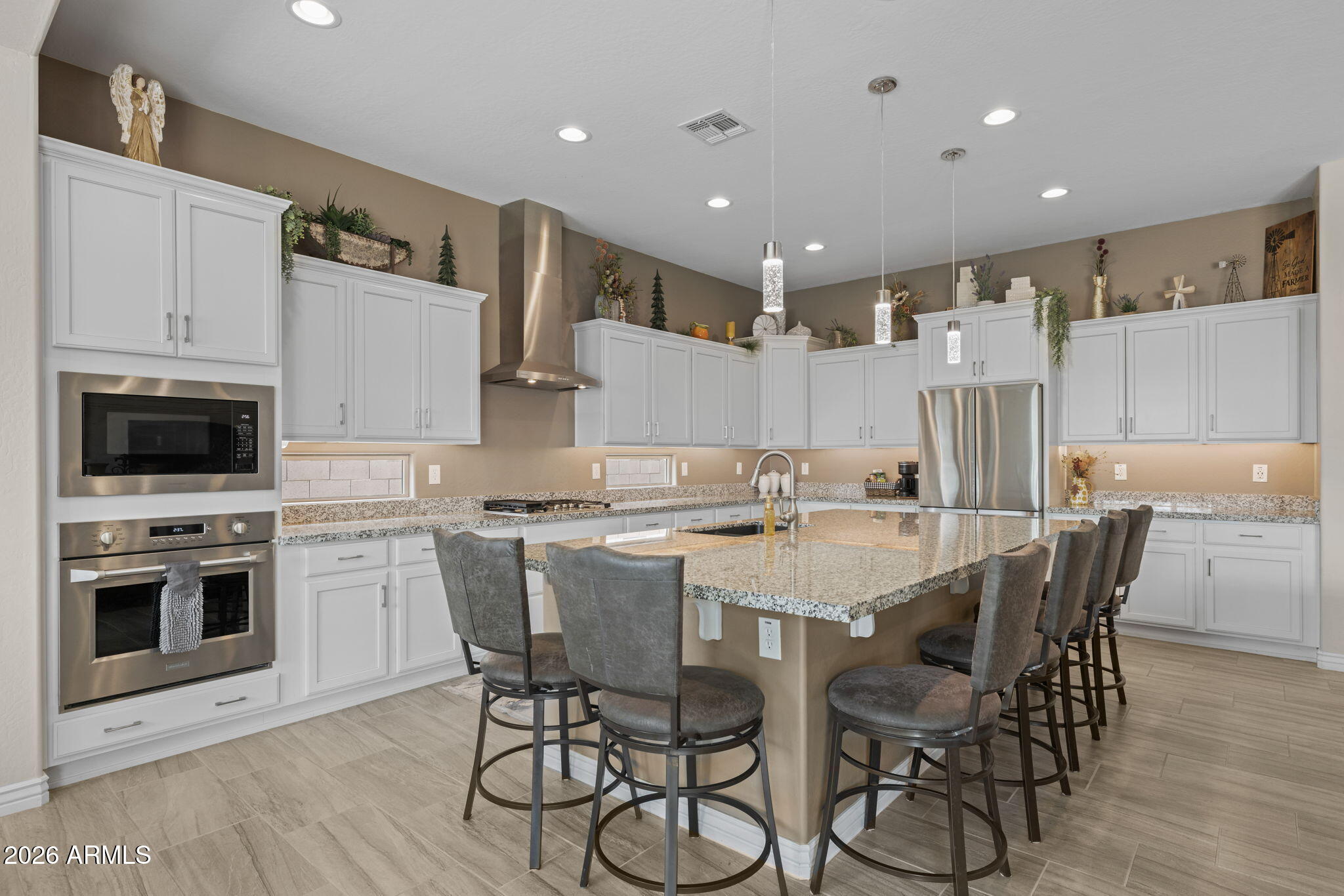 5250 South Wesley Mesa, AZ 85212 - Photo 2 of 89 a kitchen with a table and chairs in it