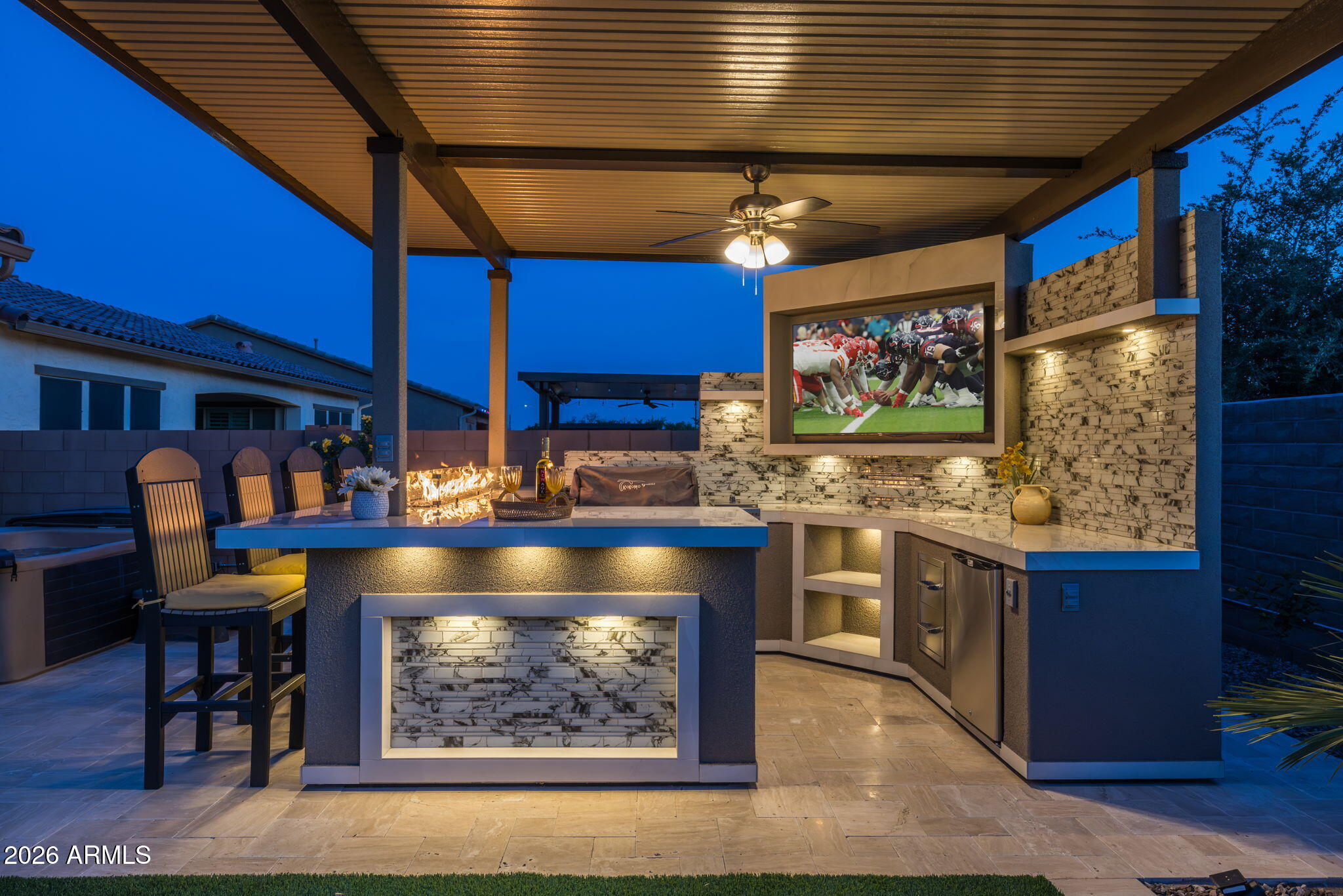 5250 South Wesley Mesa, AZ 85212 - Photo 48 of 89 a kitchen with stainless steel appliances granite countertop a stove and a wooden cabinets
