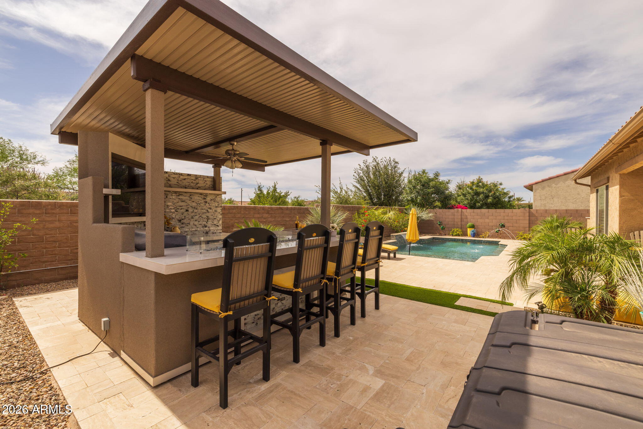 5250 South Wesley Mesa, AZ 85212 - Photo 60 of 89 a view of a patio with table and chairs under an umbrella
