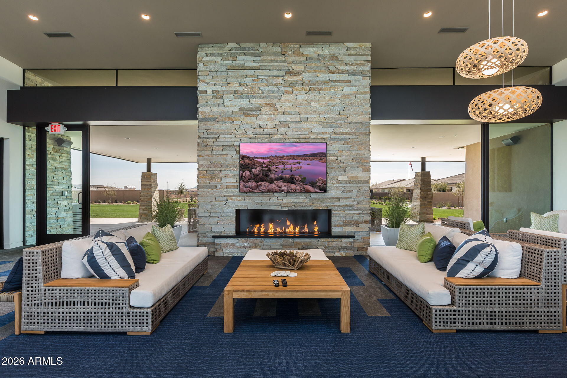 5250 South Wesley Mesa, AZ 85212 - Photo 66 of 89 a living room with furniture a rug and a fireplace