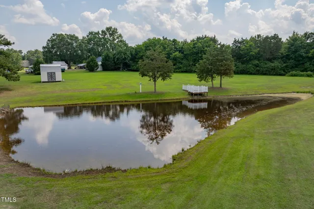 a view of a patio with a yard