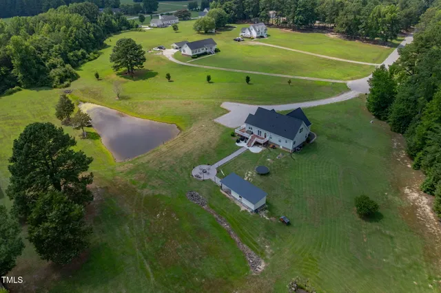 a view of a lake with a yard
