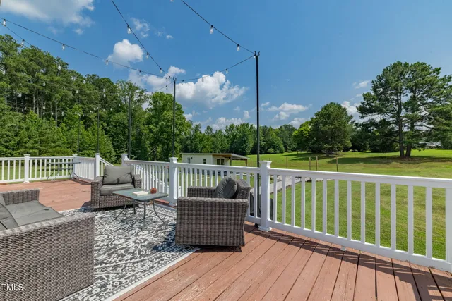 a view of a golf course with a lake