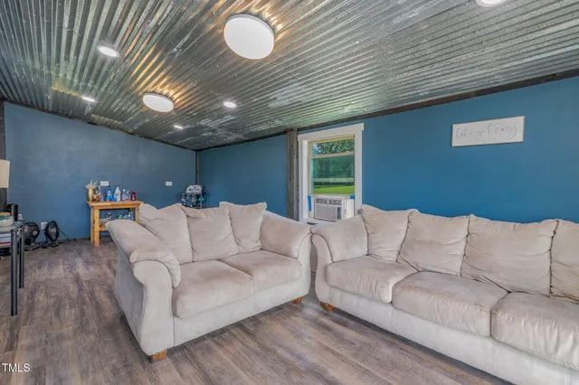 a view of a chairs on the roof deck