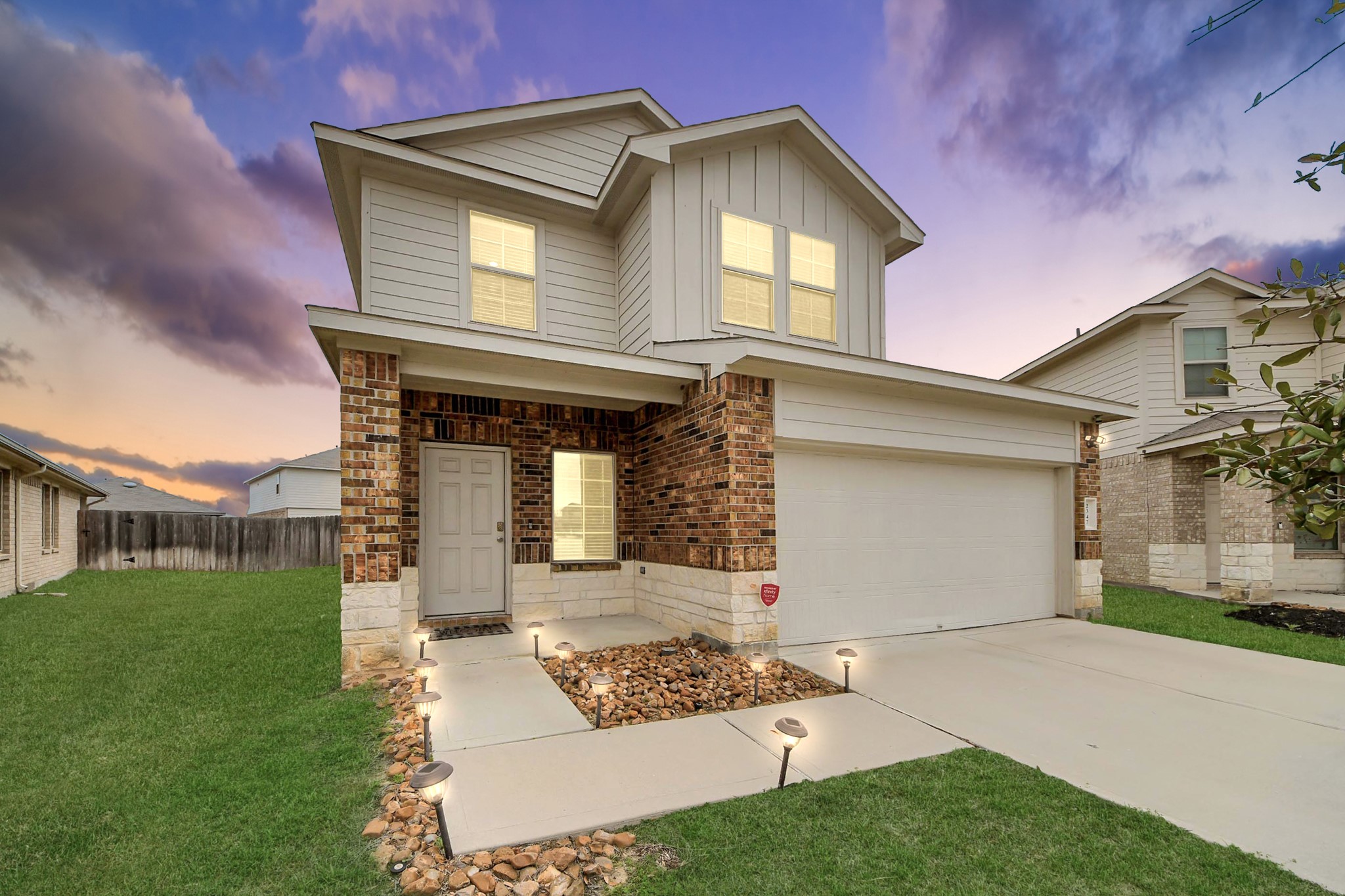 2347 Pettingell Way Spring Spring, TX 77373 - Photo 4 of 41
Gorgeous twilight exterior showcasing warm lighting and exceptional curb appeal.
