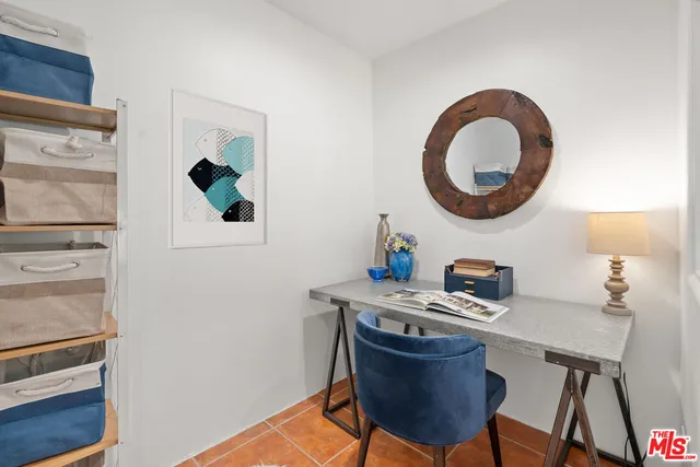 a view of a dinning table and chairs in the patio