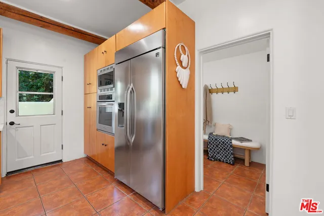 a bed room with a bed and a couch