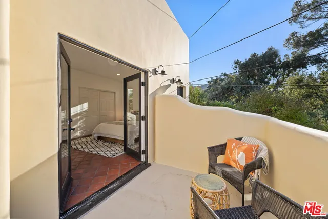 a bathroom with a toilet and a bathtub