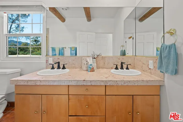 a view of a bench in a garden