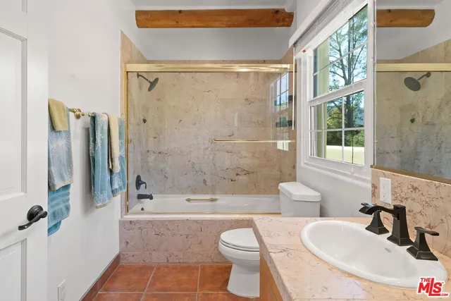 a view of backyard with green space