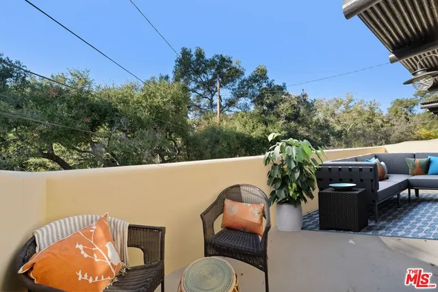 a large kitchen with stainless steel appliances lots of counter top space