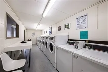 a kitchen that has a sink and a stove