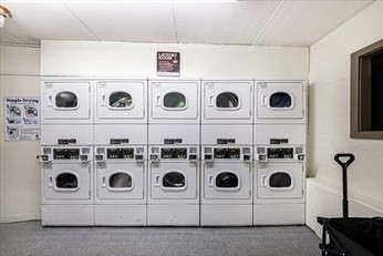 200 Swanton Street, Unit 234 Winchester, MA 01890 - Photo 10 of 17 a white stove top oven and a refrigerator