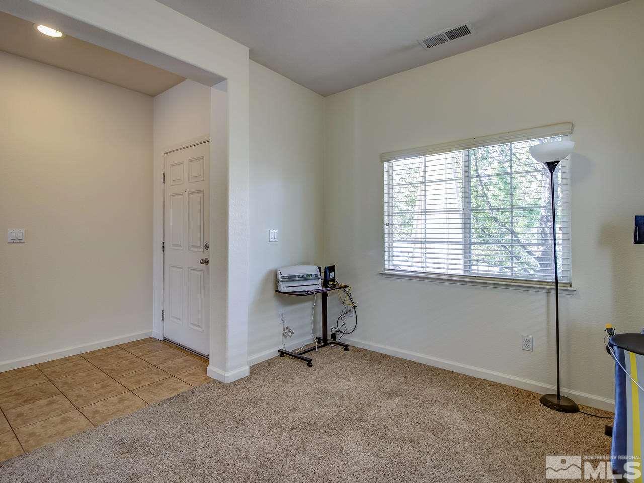 2160 Hellaby Lane Reno, NV 89502 - Photo 11 of 14 a view of an empty room with a window