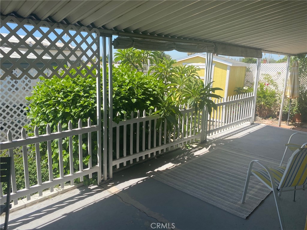 10210 Base Line Road, Unit 289 Alta Loma, CA 91701 - Photo 3 of 25 a view of balcony with wooden floor