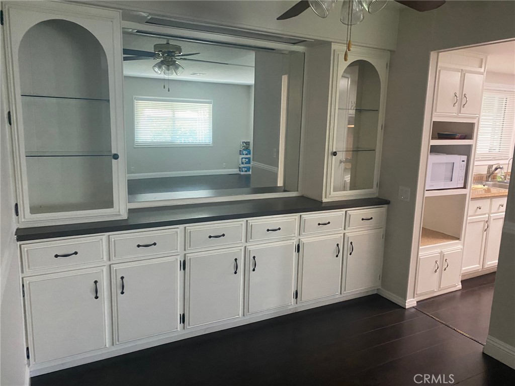 10210 Base Line Road, Unit 289 Alta Loma, CA 91701 - Photo 7 of 25 a bathroom with a double vanity sink and a mirror